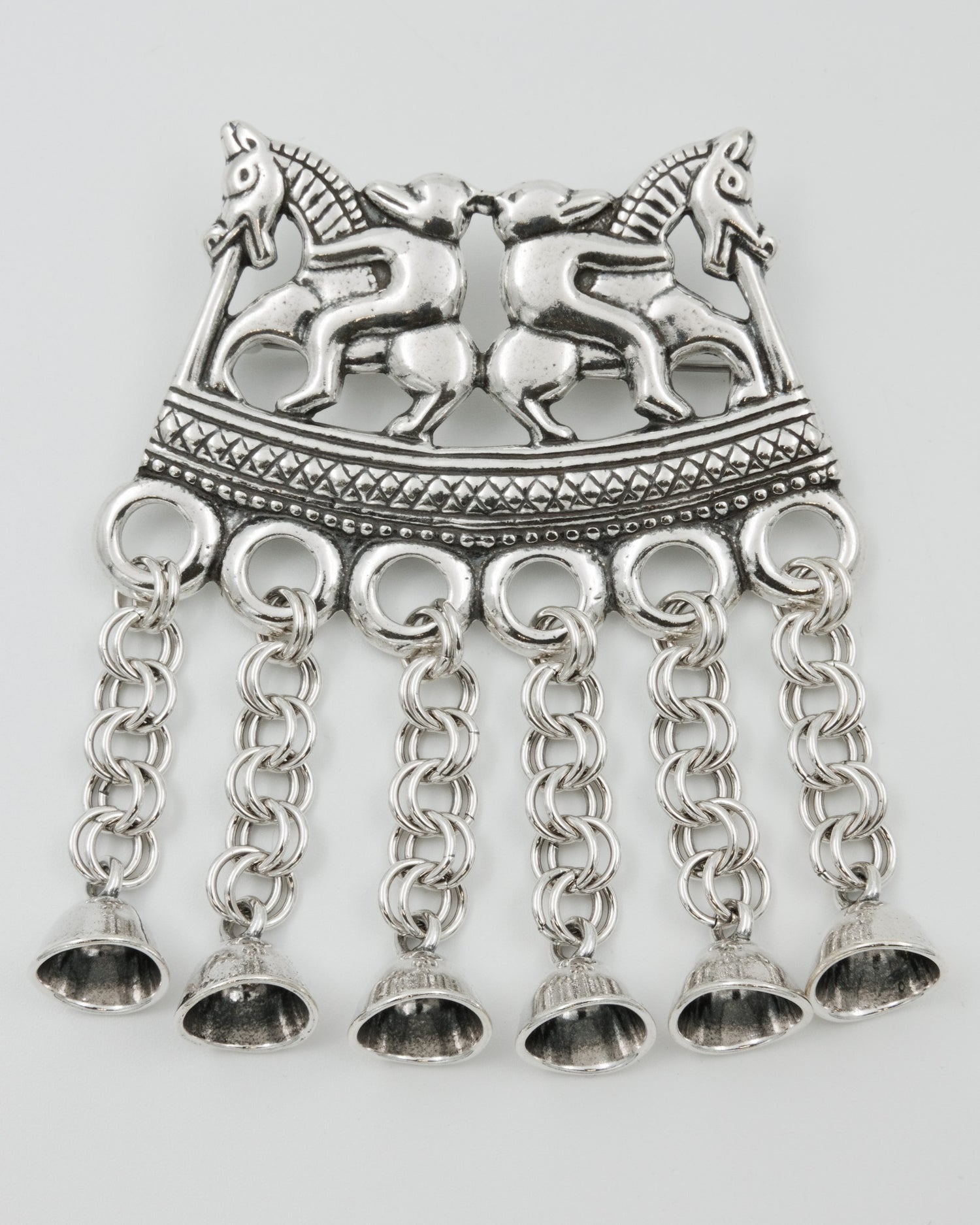 Held Two Horsemen brooch silver