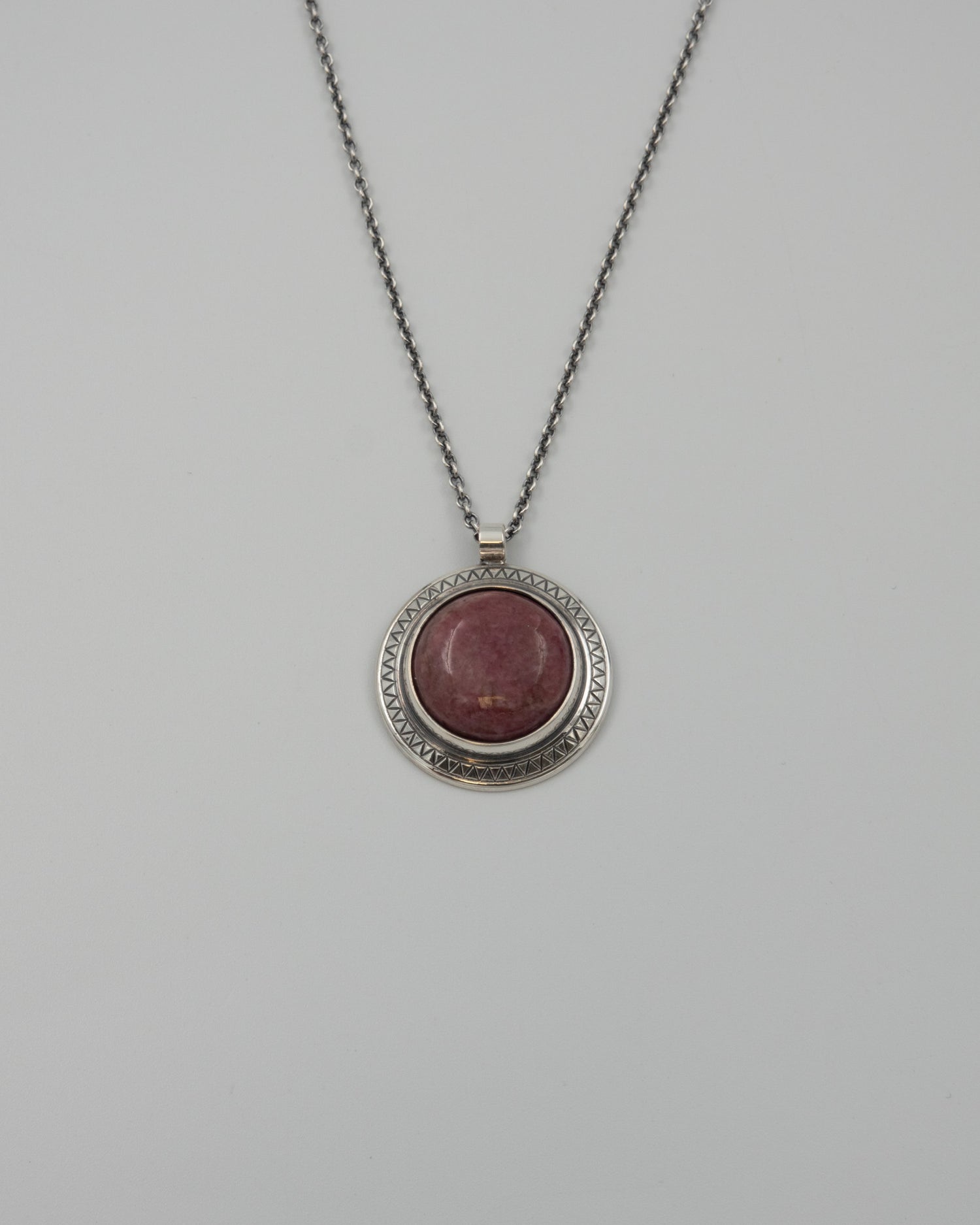 Held stone pendant 60 cm silver rhodonite