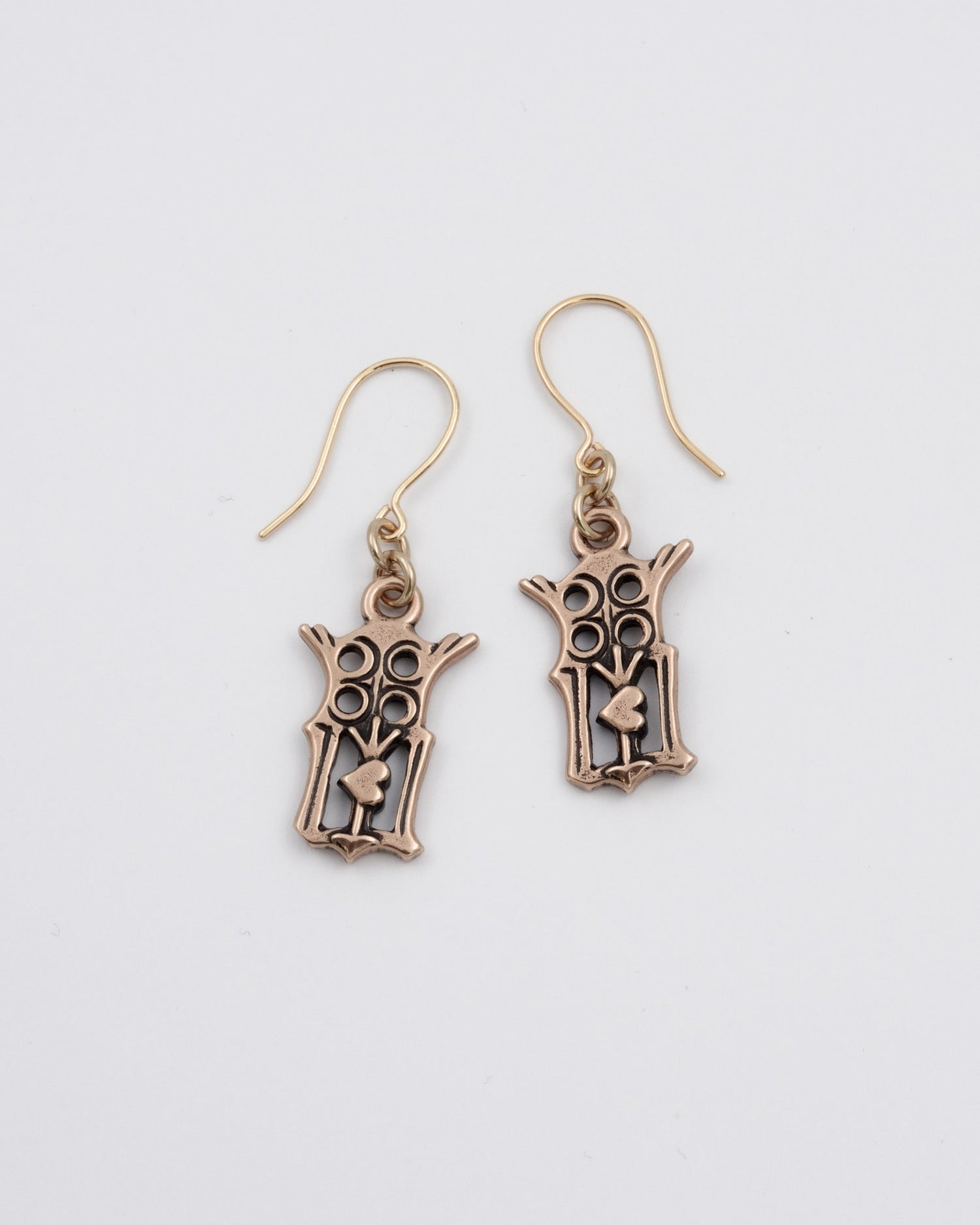 Held Virgin Mary earrings bronze